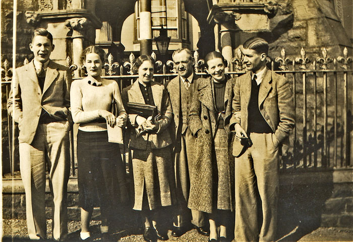 At left, John Thomas EAYRS (1913-2001), far right brother Robert James EAYRS (1915-1995), with third from left mother Florence May EAYRS ne&eacute; CLOUGH (1882-1975). Other people, location and occasion unknown. Photo abt. 1930. 